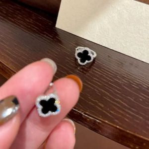 BLACK & DIAMANTÉ CLOVER STUDS