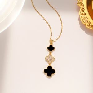 GOLD & BLACK CLOVER NECKLACE