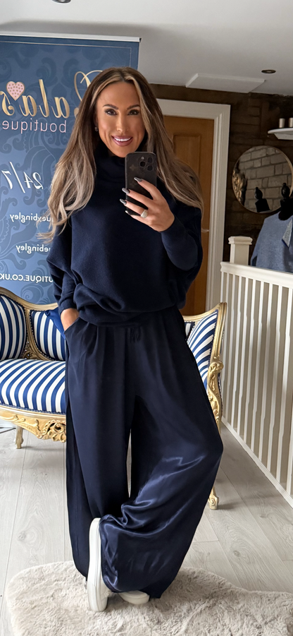 BLU ASYMETTRIC POLO NECK