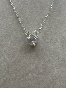 SILVER BOW NECKLACE