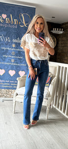 DARKER WASH JEWEL BUTTON BOOT CUT JEANS