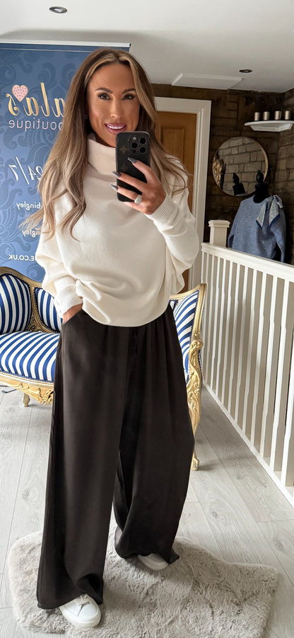 CALCE ASYMETTRIC POLO NECK