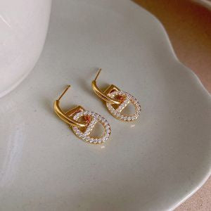 GOLD CD EARRINGS