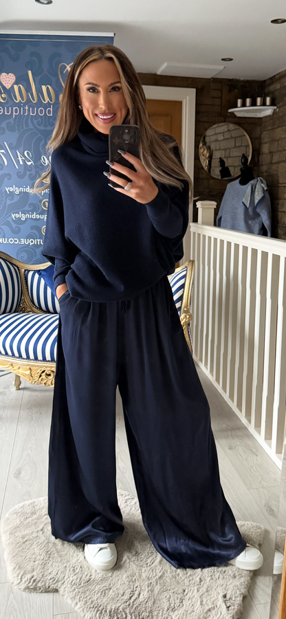 BLU ASYMETTRIC POLO NECK