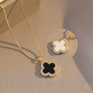 REVERSIBLE CLOVER NECKLACE