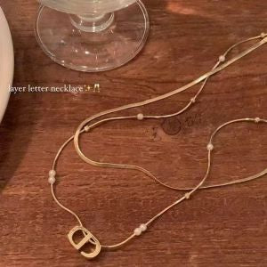 CD GOLD NECKLACE