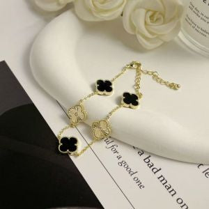 GOLD & BLACK CLOVER BRACELET